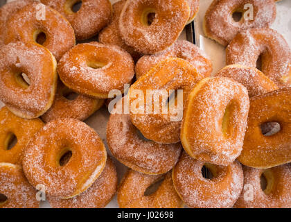 Delicious doughnuts with icing sugar,outdoor horizontal photo. Stock Photo