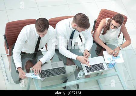 Image of a business people working in a modern office. Top view. Stock Photo