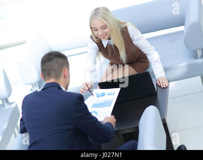 Business people working around table in modern office Stock Photo