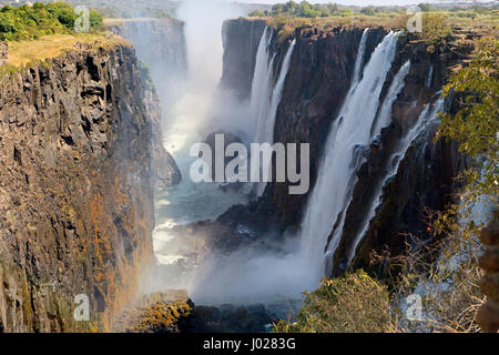 View of Victoria Falls from the ground. Mosi-oa-Tunya National park. and World Heritage Site. Zambiya. Zimbabwe. Stock Photo