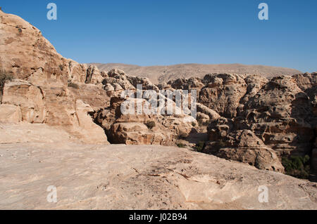 Rocks and mountains in the Siq al-Barid, the cold canyon, the main entrance to the archaeological Nabataean city of Beidha, famous as the Little Petra Stock Photo