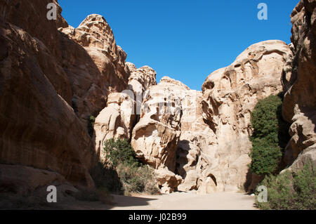 The rocks and sand in the Siq al-Barid, the cold canyon, the main entrance to the archaeological Nabataean city of Beidha, famous as the Little Petra Stock Photo