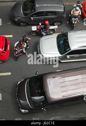 Bangkok, Thailand. 7th Apr, 2017. Motorcycles snake through heavy traffic in Bangkok, Thailand, 7 April 2017. Thailand's streets are amongst the most dangerous in the world. The kingdom has almost ten times as many road accident deaths as Germany - it is the number one cause of death amongst tourists. The risk is greatest every year during the Songkran festival. Photo: Christoph Sator/dpa/Alamy Live News Stock Photo