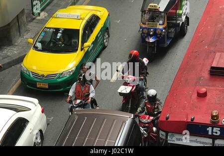 Bangkok, Thailand. 7th Apr, 2017. Motorcycles snake through heavy traffic in Bangkok, Thailand, 7 April 2017. Thailand's streets are amongst the most dangerous in the world. The kingdom has almost ten times as many road accident deaths as Germany - it is the number one cause of death amongst tourists. The risk is greatest every year during the Songkran festival. Photo: Christoph Sator/dpa/Alamy Live News Stock Photo