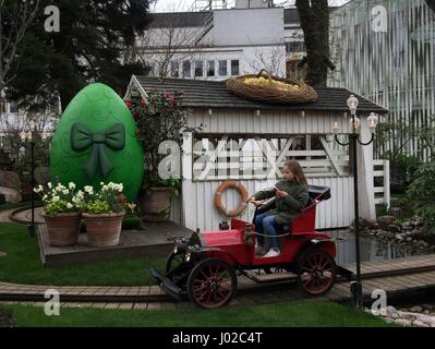 Copenhagen, Denmark. 8th Apr, 2017. A girl plays in the Tivoli Gardens, in Copenhagen, Denmark, on April 8, 2017. Tivoli Gardens, located in the center of Denmark's capital city of Copenhagen, receives visitors with a large number of Easter eggs decorated at various locations to celebrate the Easter holidays. Credit: Shi Shouhe/Xinhua/Alamy Live News