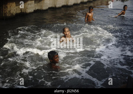 Bangladesh, Dhaka. boy jumping in the Buriganga river Stock Photo ...