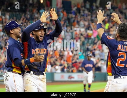 Houston Astros' George Springer (4) Is Congratulated In The Dugout 