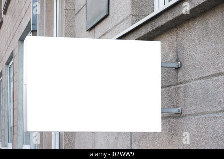 Rectangular shape mock up signboard on the wall Stock Photo