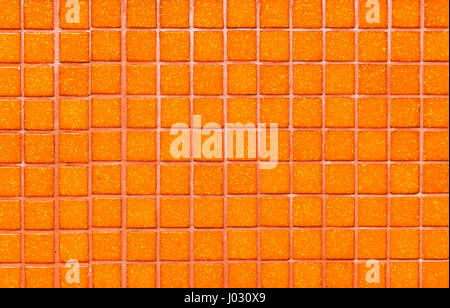 Orange ceramic colorful tiles mosaic composition pattern background Stock Photo