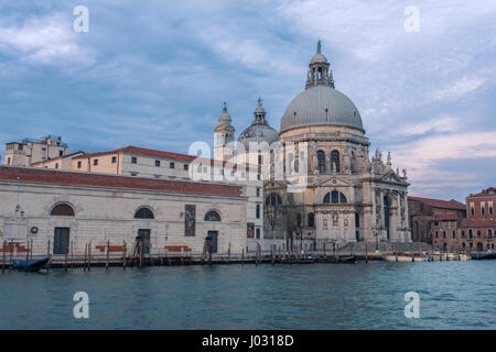 Basilica di Santa Maria della salute during blue hour seen from a vaporetto in Venice, Italy Stock Photo