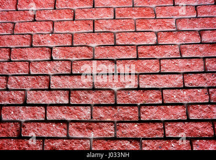 Beautiful red brick wall photographed in close-up Stock Photo