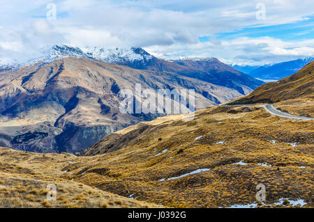 Crown Range Road near Queenstown in the Southern Lakes Region of New Zealand Stock Photo