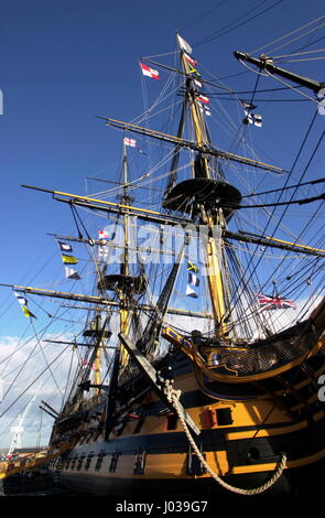 AJAXNETPHOTO. 21ST OCTOBER,2004. PORTSMOUTH, ENGLAND. - 199TH ANNIVERSARY - THE SIGNAL HOIST READING ' ENGLAND EXPECTS EVERY MAN TO DO HIS DUTY' SENT BY NELSON TO THE BRITISH FLEET AT TRAFALGAR, FLUTTERS UNDER A BRIGHT AUTUMN SKY AT PORTSMOUTH. PHOTO:JONATHAN EASTLAND/AJAX REF:D142110/109 Stock Photo