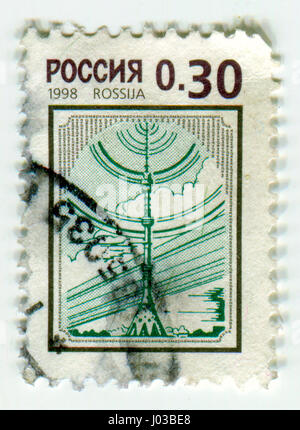 GOMEL, BELARUS, APRIL 8, 2017. Stamp printed in Russia shows image of  The Ostankino Tower is a television and radio tower in Moscow, Russia, owned by Stock Photo