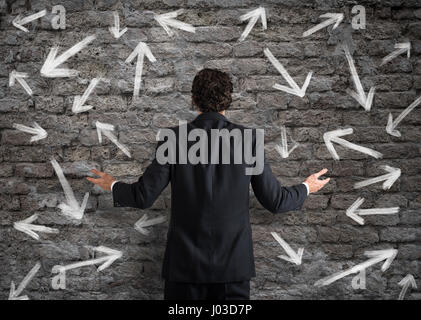 Difficult choices of a businessman Stock Photo