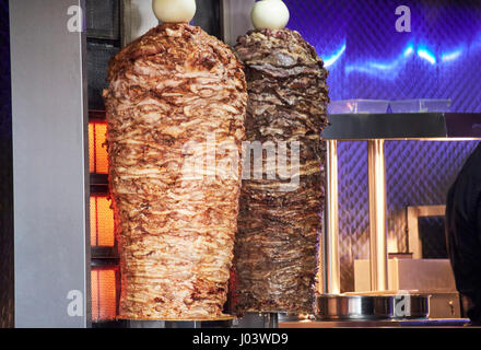 cooking kebab meat chicken and lamb in a fast food store Liverpool UK Stock Photo