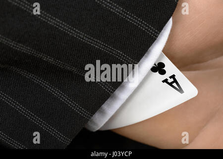 Having an ace up the sleeve in the hole Stock Photo