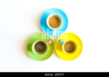 Three colorful coffee cups isolated on white background Stock Photo