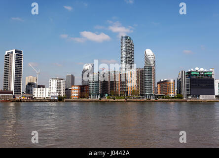 View of New Providence Wharf, across the River Thames from the Thames Path  around the Greenwich Peninsular Stock Photo
