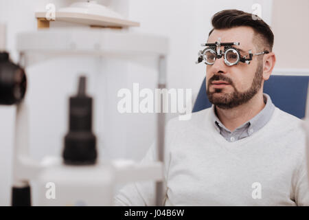Nice bearded man sitting in the chair Stock Photo