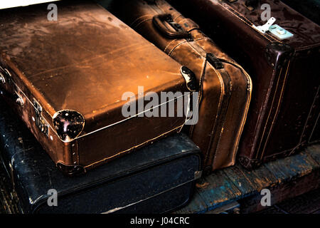 Old Suitcases in railway station Stock Photo