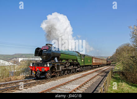 A3 60103 Flying Scotsman departs Keighley with WD 90733 banking at the Keighley & Worth Valley Railway on 8 April 2017. Stock Photo