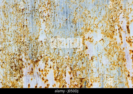Peeling rusty metal texture Stock Photo