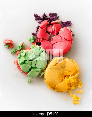 Three squashed macarons isolated on a white background Stock Photo
