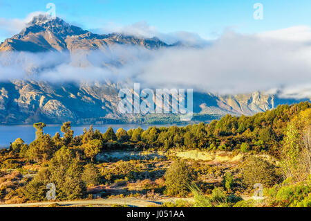 Low clouds in the mountains in Lord of the Rings film location, Glenorchy, New Zealand Stock Photo