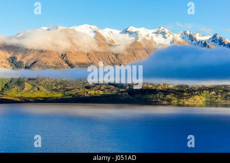 Clouds over the lake in Lord of the Rings film location, Glenorchy, New Zealand Stock Photo