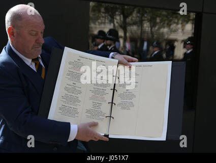 The names of fallen officers Pc Keith Palmer and Pc Gareth Browning are added to the National Police Officers Roll of Honour & Remembrance during a Police Roll of Honour Trust ceremony in London. ASSOCIATION Photo. Picture date: Monday April 10, 2017. Pc Palmer was killed in the Westminster attack in March while Pc Browning died in April, more than three years after being seriously injured when he was hit at high speed by a stolen car while on duty. See PA story POLICE Westminster. Photo credit should read: Rick Findler/PA Wire Stock Photo