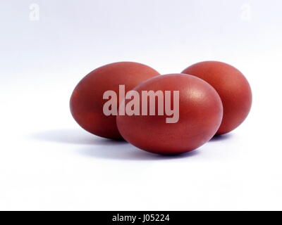 Easter eggs. Eggs dyed with onion peel. Isolated on white background. Stock Photo