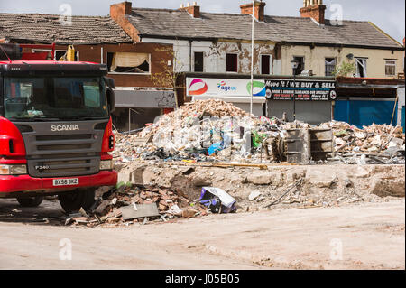 New Ferry, Wirral, UK. 10th April, 2017. The scene of the recent massive gas explosion has now been handed over from Merseyside Police to WIrral Borough Council.  The cleanup operation commences and, for the first time, residents and business owners are being allowed into the area to retrieve belongings, of which a great many clothes and personal effects are strewn across the scene.  The damage is so great, that a lot of the buildings will need to be demolished and rebuilt. © Paul Warburton Stock Photo