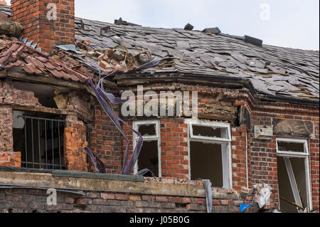 New Ferry, Wirral, UK. 10th April, 2017. The scene of the recent massive gas explosion has now been handed over from Merseyside Police to WIrral Borough Council.  The cleanup operation commences and, for the first time, residents and business owners are being allowed into the area to retrieve belongings, of which a great many clothes and personal effects are strewn across the scene.  The damage is so great, that a lot of the buildings will need to be demolished and rebuilt. © Paul Warburton Stock Photo