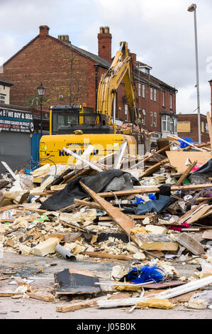 New Ferry, Wirral, UK. 10th April, 2017. The scene of the recent massive gas explosion has now been handed over from Merseyside Police to WIrral Borough Council.  The cleanup operation commences and, for the first time, residents and business owners are being allowed into the area to retrieve belongings, of which a great many clothes and personal effects are strewn across the scene.  The damage is so great, that a lot of the buildings will need to be demolished and rebuilt. © Paul Warburton Stock Photo