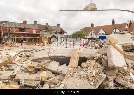 New Ferry, Wirral, UK. 10th April, 2017. The scene of the recent massive gas explosion has now been handed over from Merseyside Police to WIrral Borough Council.  The cleanup operation commences and, for the first time, residents and business owners are being allowed into the area to retrieve belongings, of which a great many clothes and personal effects are strewn across the scene.  The damage is so great, that a lot of the buildings will need to be demolished and rebuilt. © Paul Warburton Stock Photo