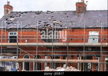 New Ferry, Wirral, UK. 10th April, 2017. The scene of the recent massive gas explosion has now been handed over from Merseyside Police to WIrral Borough Council.  The cleanup operation commences and, for the first time, residents and business owners are being allowed into the area to retrieve belongings, of which a great many clothes and personal effects are strewn across the scene.  The damage is so great, that a lot of the buildings will need to be demolished and rebuilt. © Paul Warburton Stock Photo