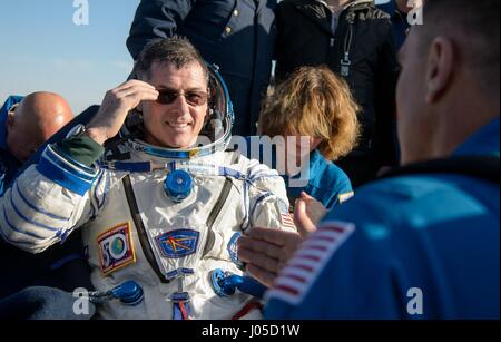 Zhezkazgan, Kazakhstan. 10th Apr, 2017.  NASA astronaut Shane Kimbrough rests shortly after landing in the Soyuz MS-02 spacecraft April 10, 2017 near Zhezkazgan, Kazakhstan. The spacecraft returned carrying the International Space Station Expedition 50 mission crew Kimbrough and cosmonauts Sergey Ryzhikov and Andrey Borisenko of Roscosmos after 173 days in space. Credit: Planetpix/Alamy Live News Stock Photo