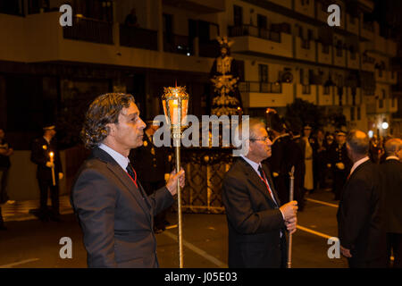 Adeje, Tenerife, Spain. 10th Apr, 2017. The first of the Holy Week processions takes place in the Las Vinas area of Adeje town. Candle bearers accompany the procession. Credit: Phil Crean A/Alamy Live News Stock Photo