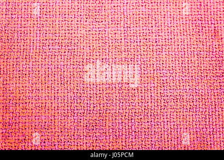 A background with a texture of a rose color Stock Photo