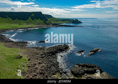 The Giant's Causeway, over Port Noffer (Giant's Bay), from the Causeway Coast footpath, County Antrim, Northern Ireland, UK Stock Photo