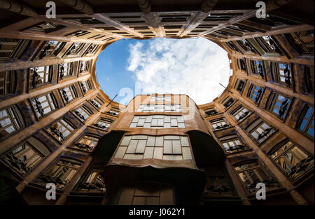 Looking up from an inner courtyard inside Casa Mila (La Pedrera) in Barcelona, Spain Europe EU