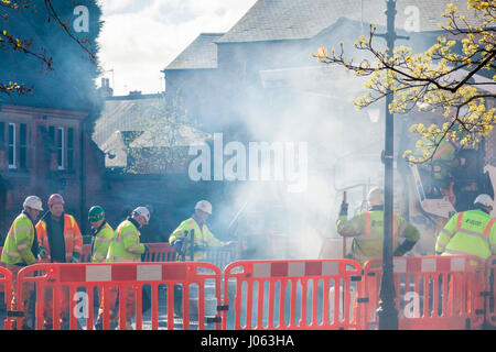Road workers or labourers resurfacing a road, Nottinghamshire, England, UK Stock Photo