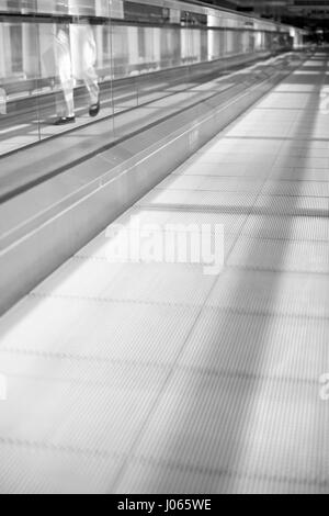 A moving walkway in an airport. Stock Photo