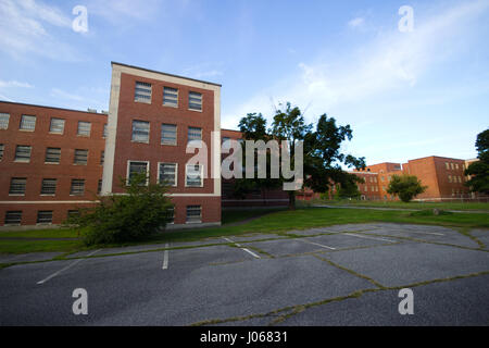 CONNECTICUT, USA: HAUNTING images from inside one of America’s top spots for ghost-hunters who claim to see a young glowing girl dressed in white staring out of the windows of this abandoned asylum. The psychiatric hospital appeared under a false name on MTV’s hit show Fear which saw contestants spend a weekend at various haunted locations around the country. These eerie photographs were taken by urban explorer Drew Thomas Scavello (27) at the Fairfield Hills State Hospital in Newtown, Connecticut. Drew Thomas Scavello / mediadrumworld.com Stock Photo