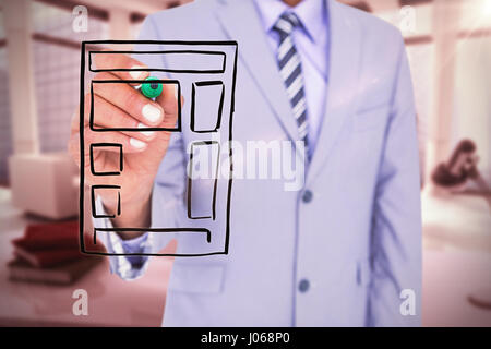 Midsection of businessman writing with marker against computer generated image of workplace Stock Photo