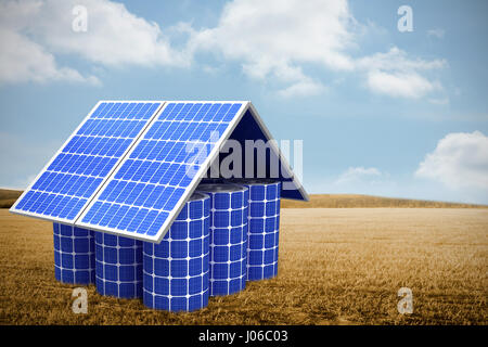 3d image of model home made from solar cells and panels against bright brown landscape Stock Photo