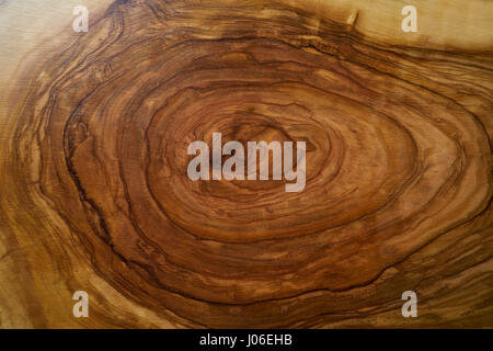 Olive tree wood texture from a wooden table cutting board Stock Photo