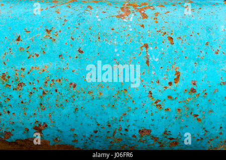 Old rusty wall colored light blue ,background Stock Photo