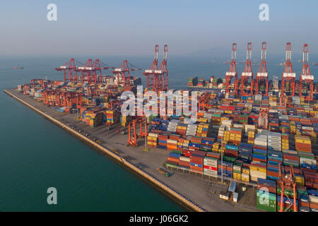 A section of Shenzhen port viewed from the air near Shekou, Nanshan. Shenzhen is the second busiest port in China and one of the busiest in the world. Stock Photo